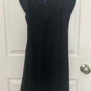 Express Black Dress with Elegant Detailing